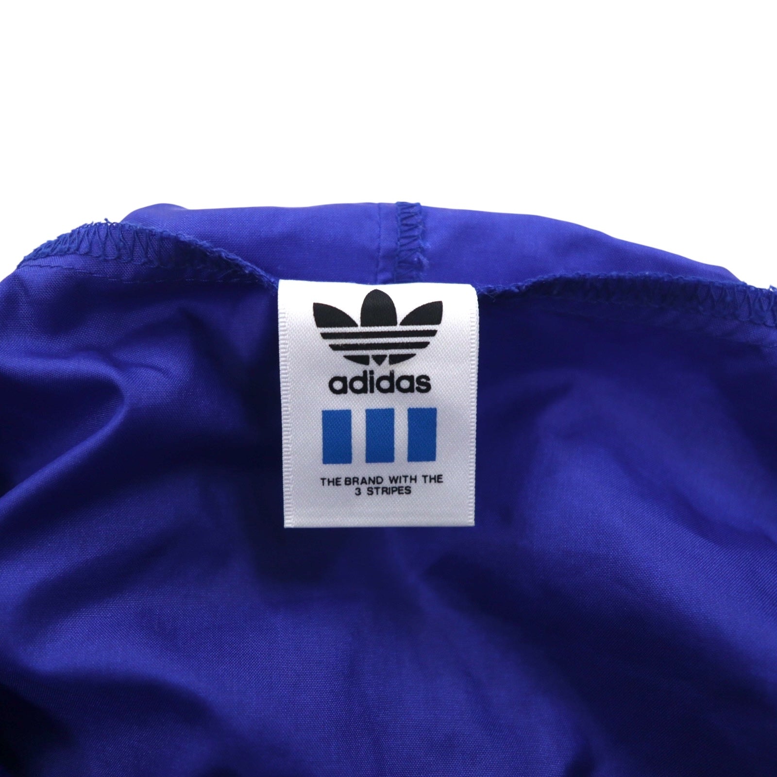 Adidas anni '90, prodotta da Descente, giacca shell con logo Trifoglio, impermeabile, taglia M-L, in nylon idrorepellente, made in Japan.