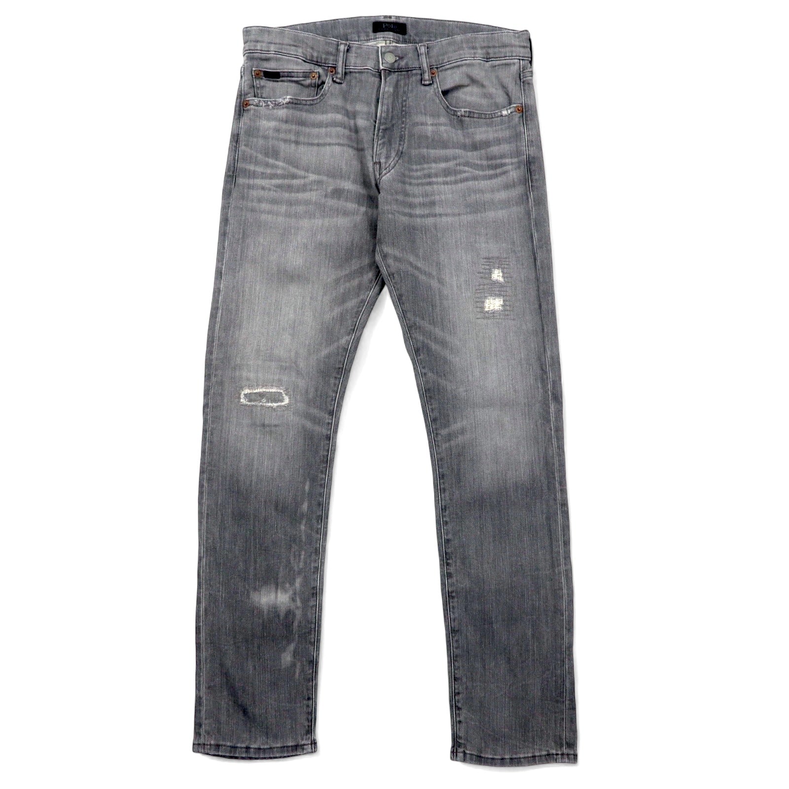 Polo RALPH LAUREN jeans skinny in denim distressed, taglia 30, grigi, in cotone stretch, con toppa in pelle, chiusura a zip, made in Turchia.