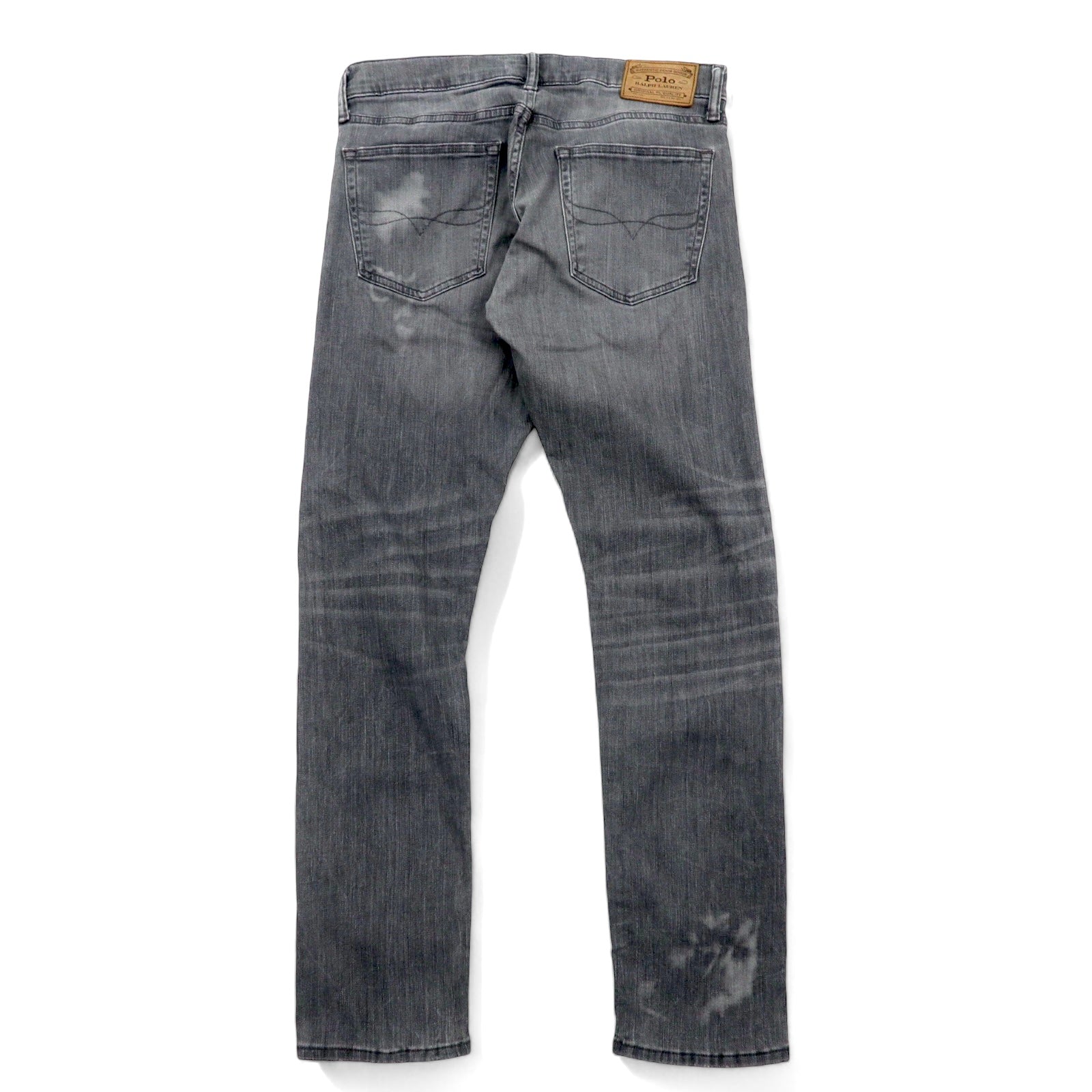 Polo RALPH LAUREN jeans skinny in denim distressed, taglia 30, grigi, in cotone stretch, con toppa in pelle, chiusura a zip, made in Turchia.