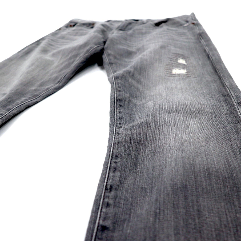Polo RALPH LAUREN jeans skinny in denim distressed, taglia 30, grigi, in cotone stretch, con toppa in pelle, chiusura a zip, made in Turchia.