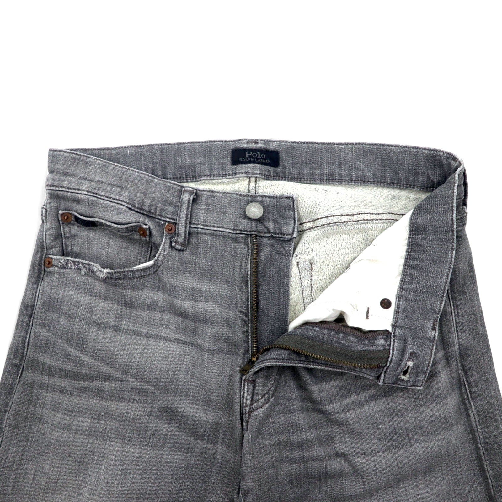 Polo RALPH LAUREN jeans skinny in denim distressed, taglia 30, grigi, in cotone stretch, con toppa in pelle, chiusura a zip, made in Turchia.