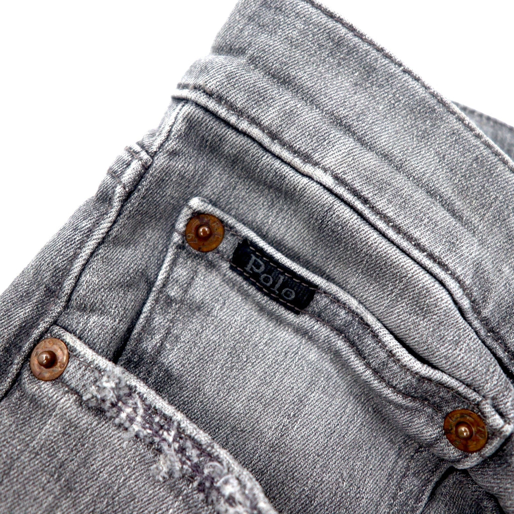 Polo RALPH LAUREN jeans skinny in denim distressed, taglia 30, grigi, in cotone stretch, con toppa in pelle, chiusura a zip, made in Turchia.