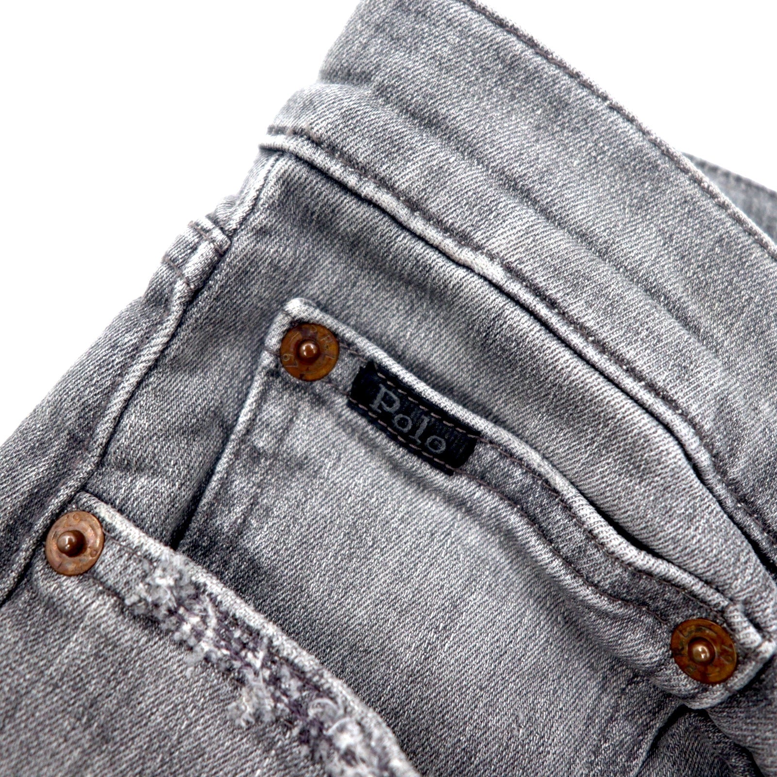 Polo RALPH LAUREN jeans skinny in denim distressed, taglia 30, grigi, in cotone stretch, con toppa in pelle, chiusura a zip, made in Turchia.