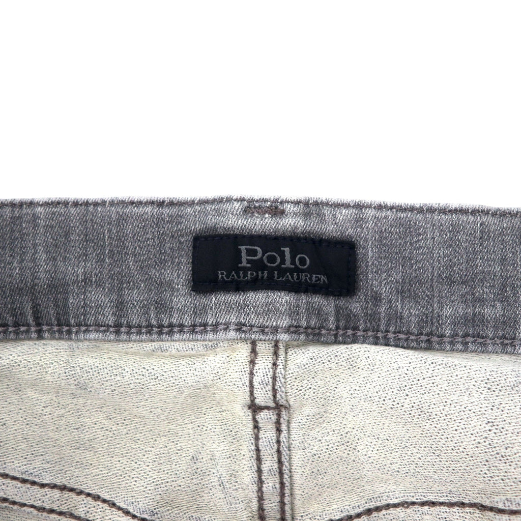 Polo RALPH LAUREN jeans skinny in denim distressed, taglia 30, grigi, in cotone stretch, con toppa in pelle, chiusura a zip, made in Turchia.