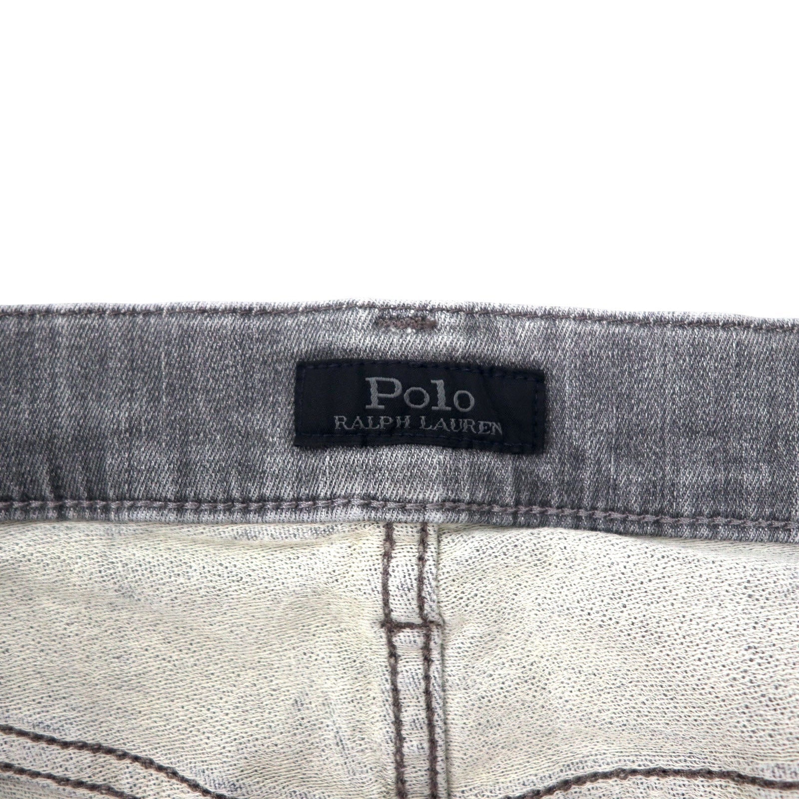 Polo RALPH LAUREN jeans skinny in denim distressed, taglia 30, grigi, in cotone stretch, con toppa in pelle, chiusura a zip, made in Turchia.