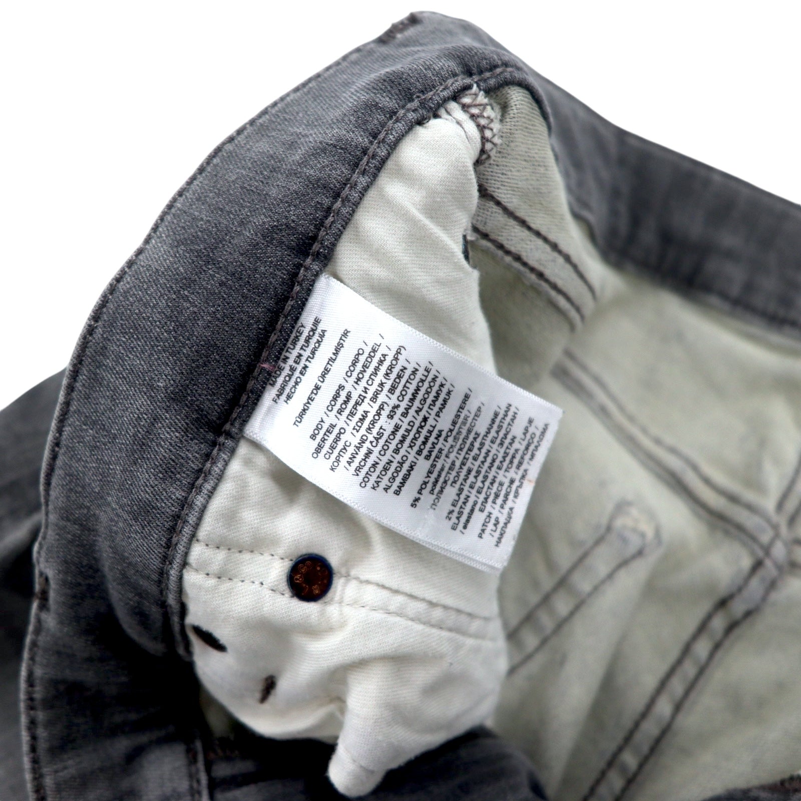 Polo RALPH LAUREN jeans skinny in denim distressed, taglia 30, grigi, in cotone stretch, con toppa in pelle, chiusura a zip, made in Turchia.