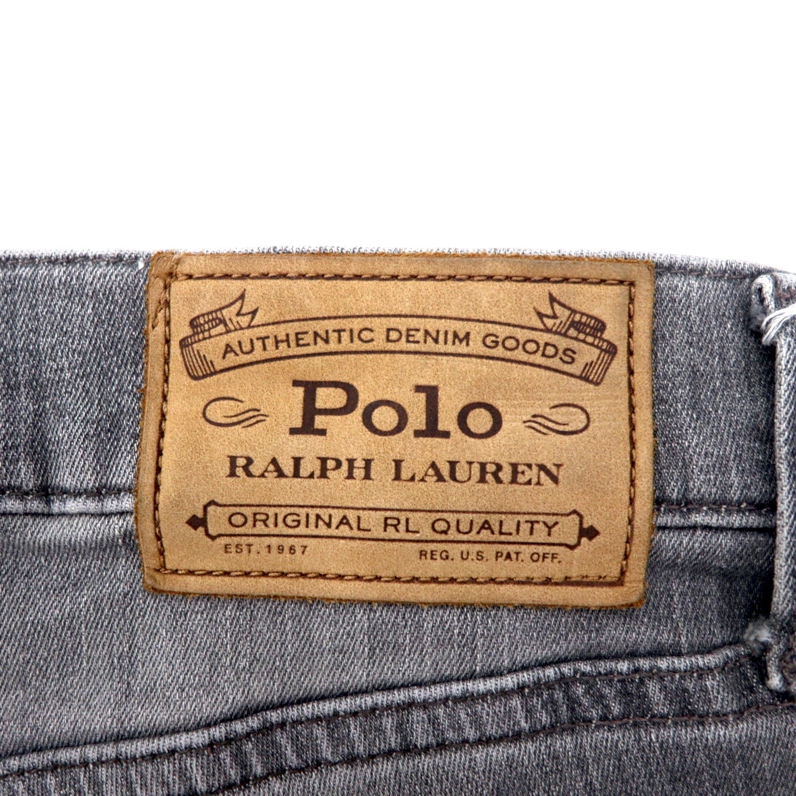Polo RALPH LAUREN jeans skinny in denim distressed, taglia 30, grigi, in cotone stretch, con toppa in pelle, chiusura a zip, made in Turchia.