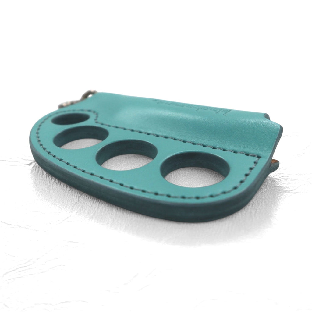 blackmeans accendino "knuckle duster" turchese blu pelle moschettone