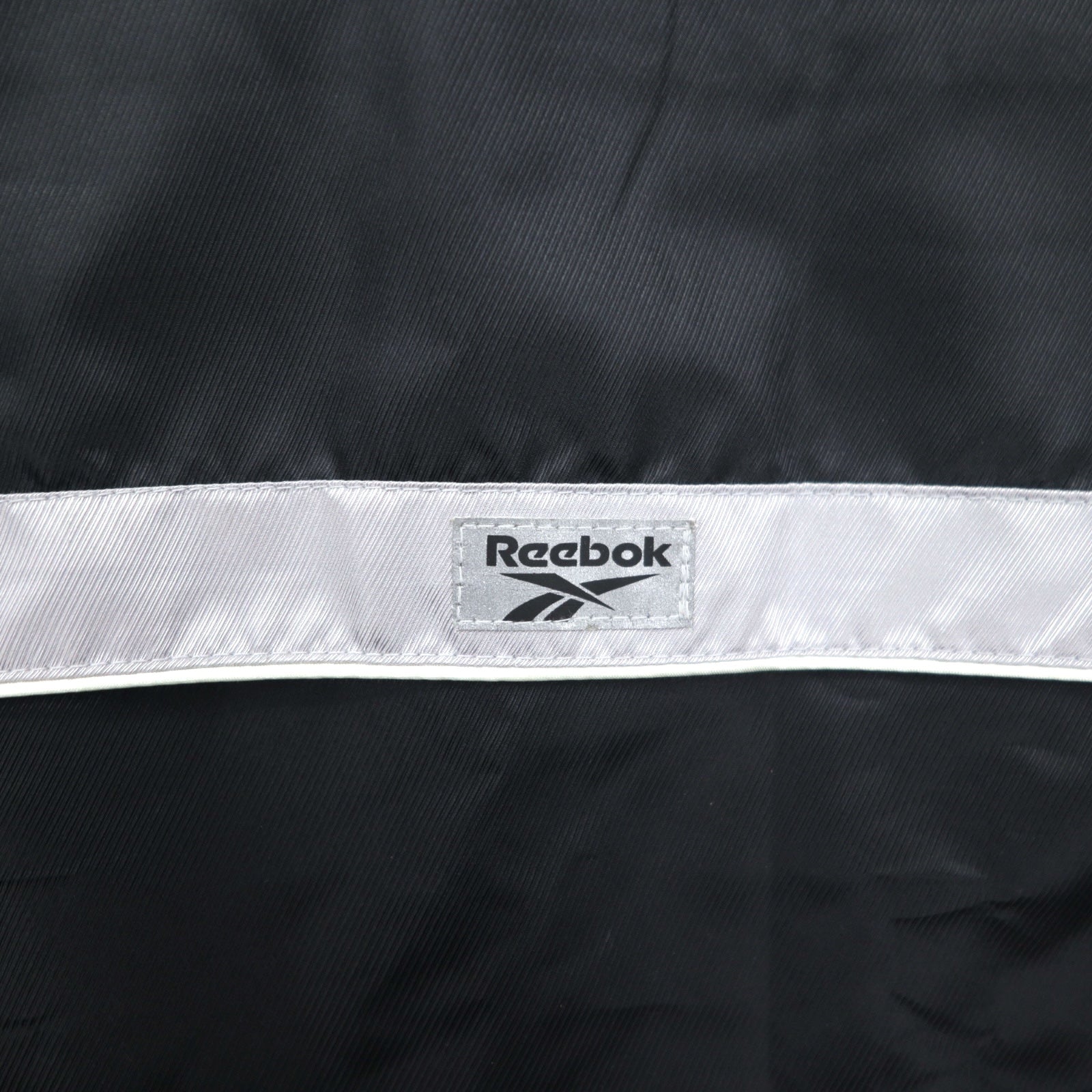 Reebok Giacca in nylon anni '90, giacca da pista, tuta sportiva, L, nero, grigio, logo ricamato