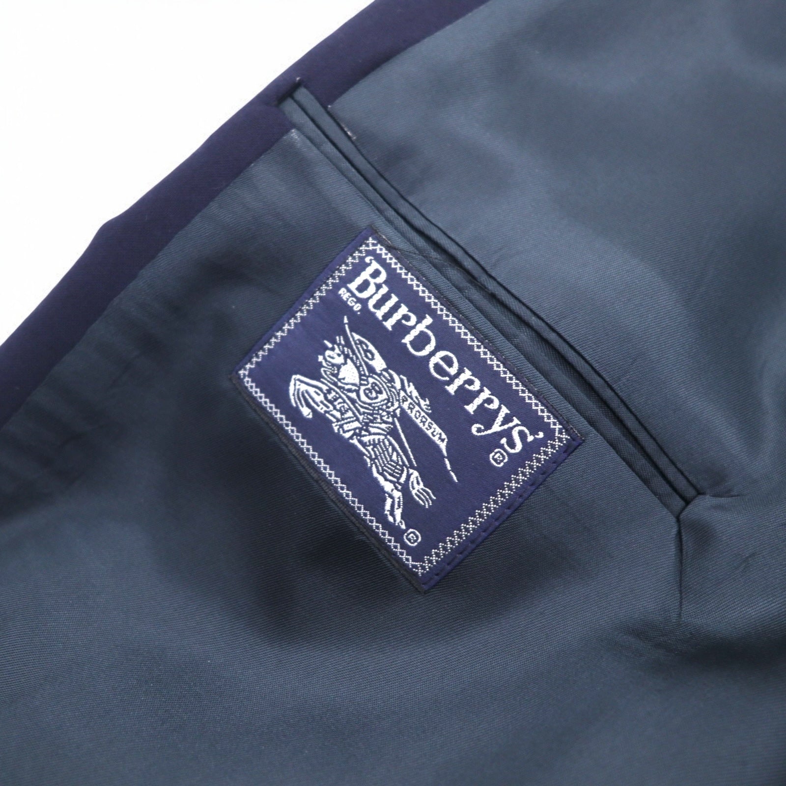 Burberry's USA Blazer doppiopetto in lana Super 100's, blu navy, taglia L, con etichetta ACTWU, bottoni dorati e revers a punta.