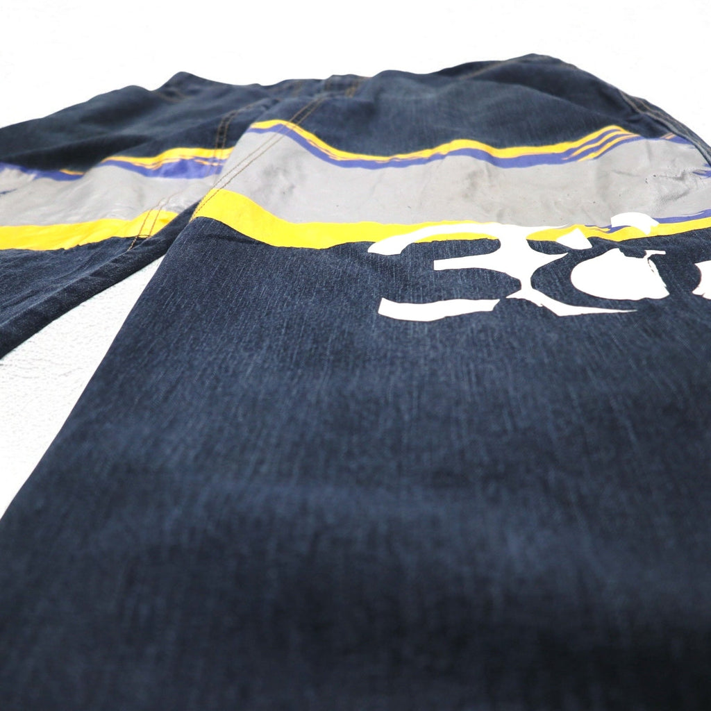 MARITHE + FRANCOIS GIRBAUD Pantaloni larghi in denim baggy XL Indigo Blu con design a vernice