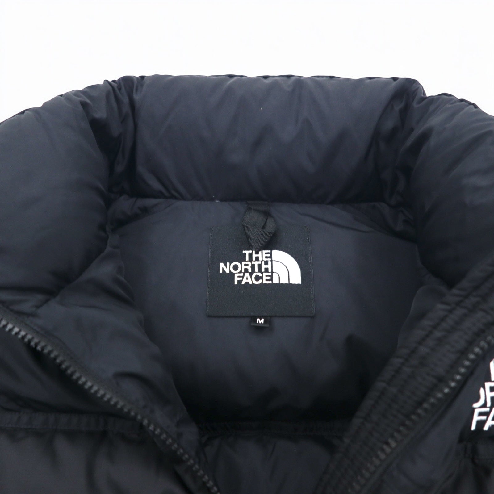 THE NORTH FACE Piumino corto Short Nuptse Jacket nero in nylon, taglia M, NDW91952