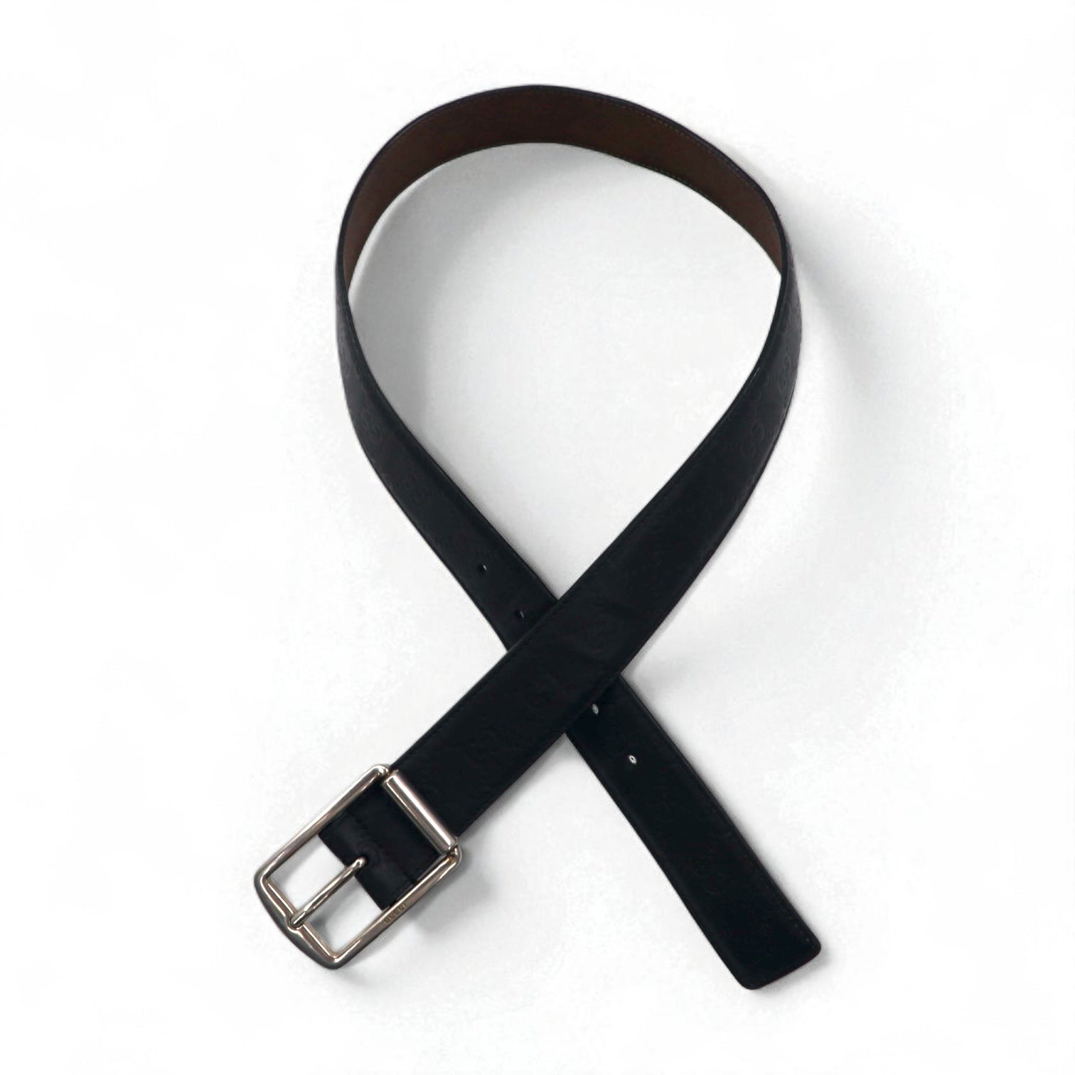 GUCCI Cintura in pelle Guccissima made in Italy nera, motivo GG in rilievo, fibbia color argento 295331