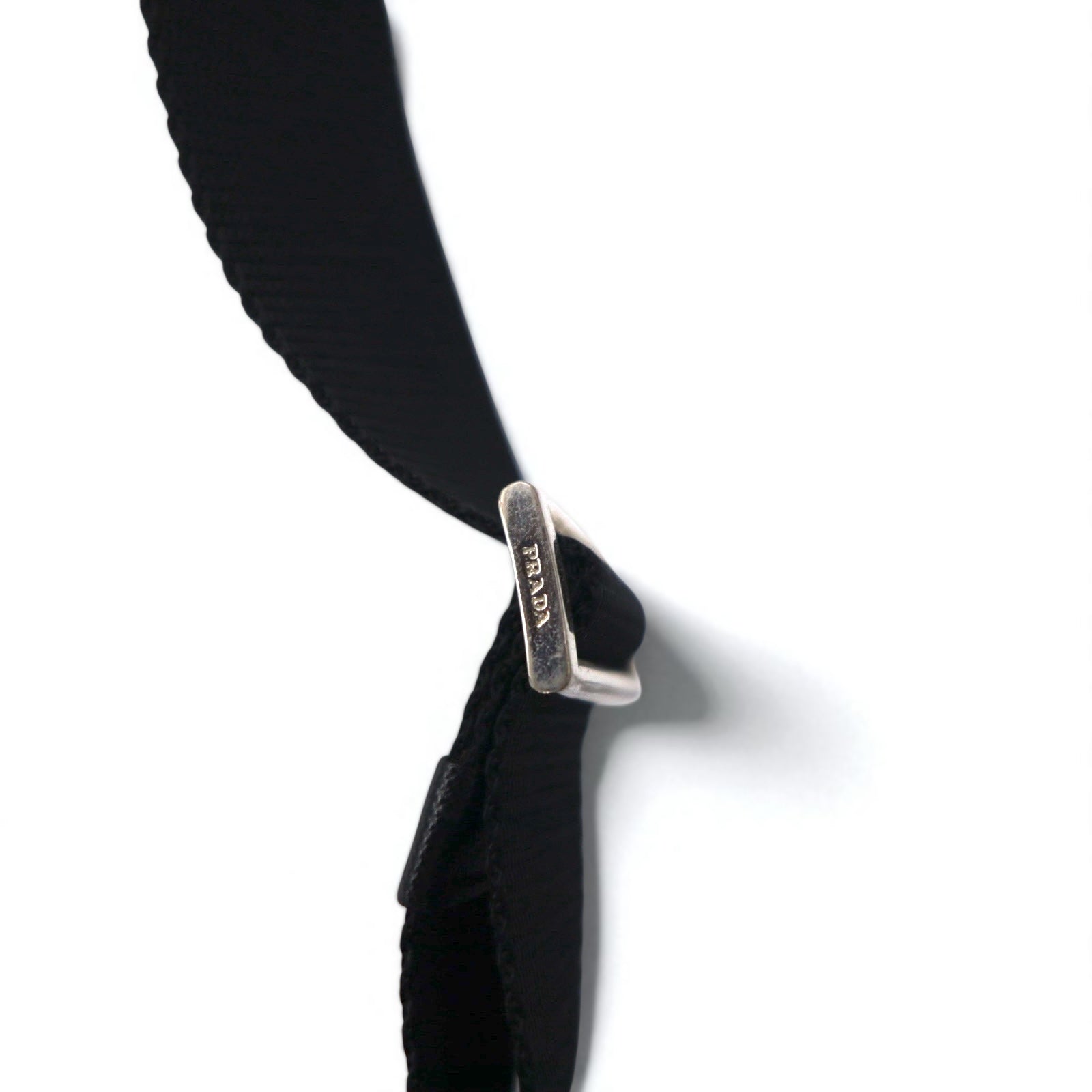 Borsa a tracolla PRADA in nylon nero con logo triangolare, made in Italy