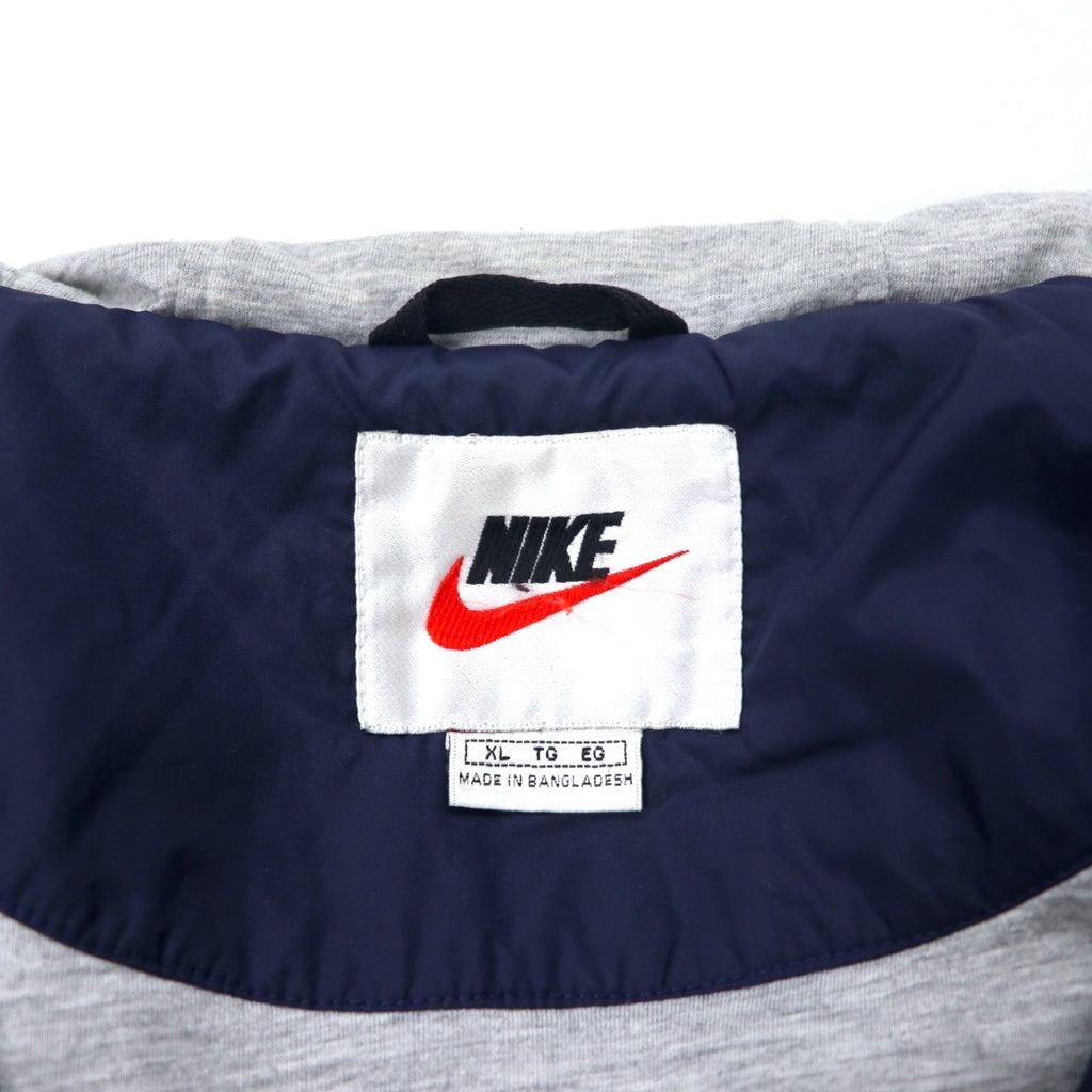 NIKE anni '90 Shell Parka Giacca a vento in nylon XL Blu navy Logo Swoosh ricamato Etichetta argentata Taglia grande