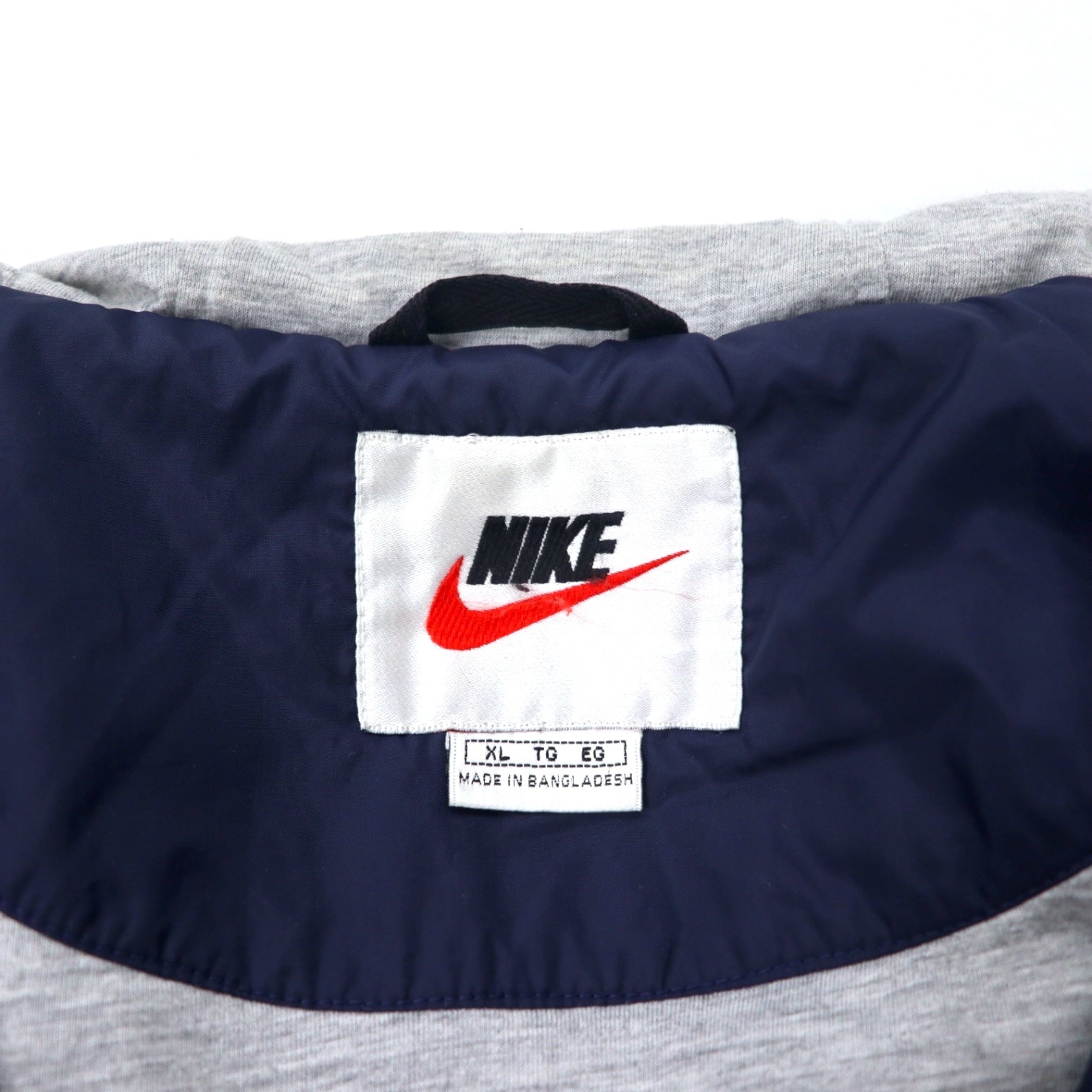 NIKE anni '90 Shell Parka Giacca a vento in nylon XL Blu navy Logo Swoosh ricamato Etichetta argentata Taglia grande