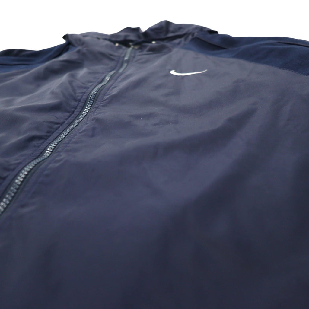 NIKE anni '90 Shell Parka Giacca a vento in nylon XL Blu navy Logo Swoosh ricamato Etichetta argentata Taglia grande