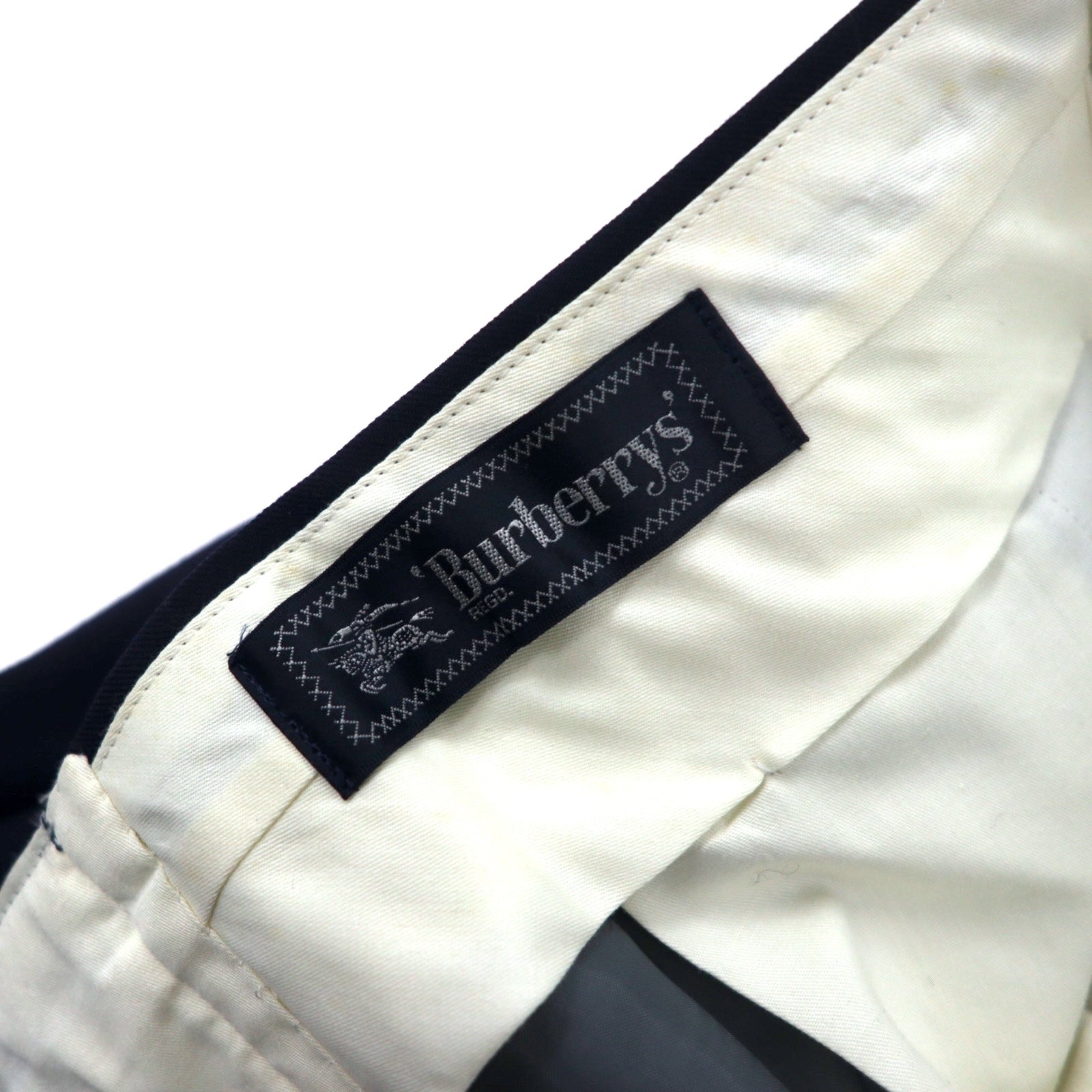 Pantalone ampio con pinces in gabardine old Burberrys, taglia 88, blu navy, lana, made in Japan