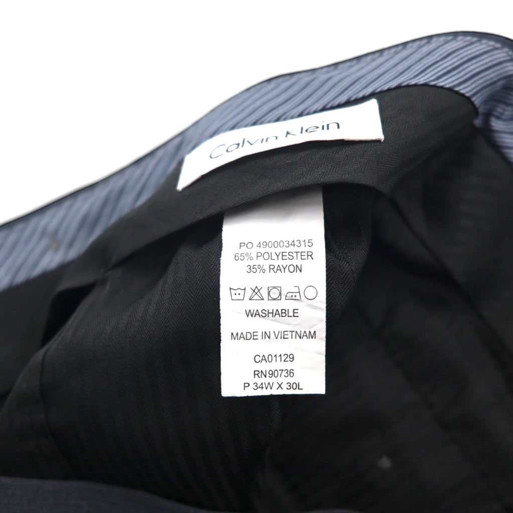 Calvin Klein スラックス パンツ L グレー ポリエステル ウォッシャブル