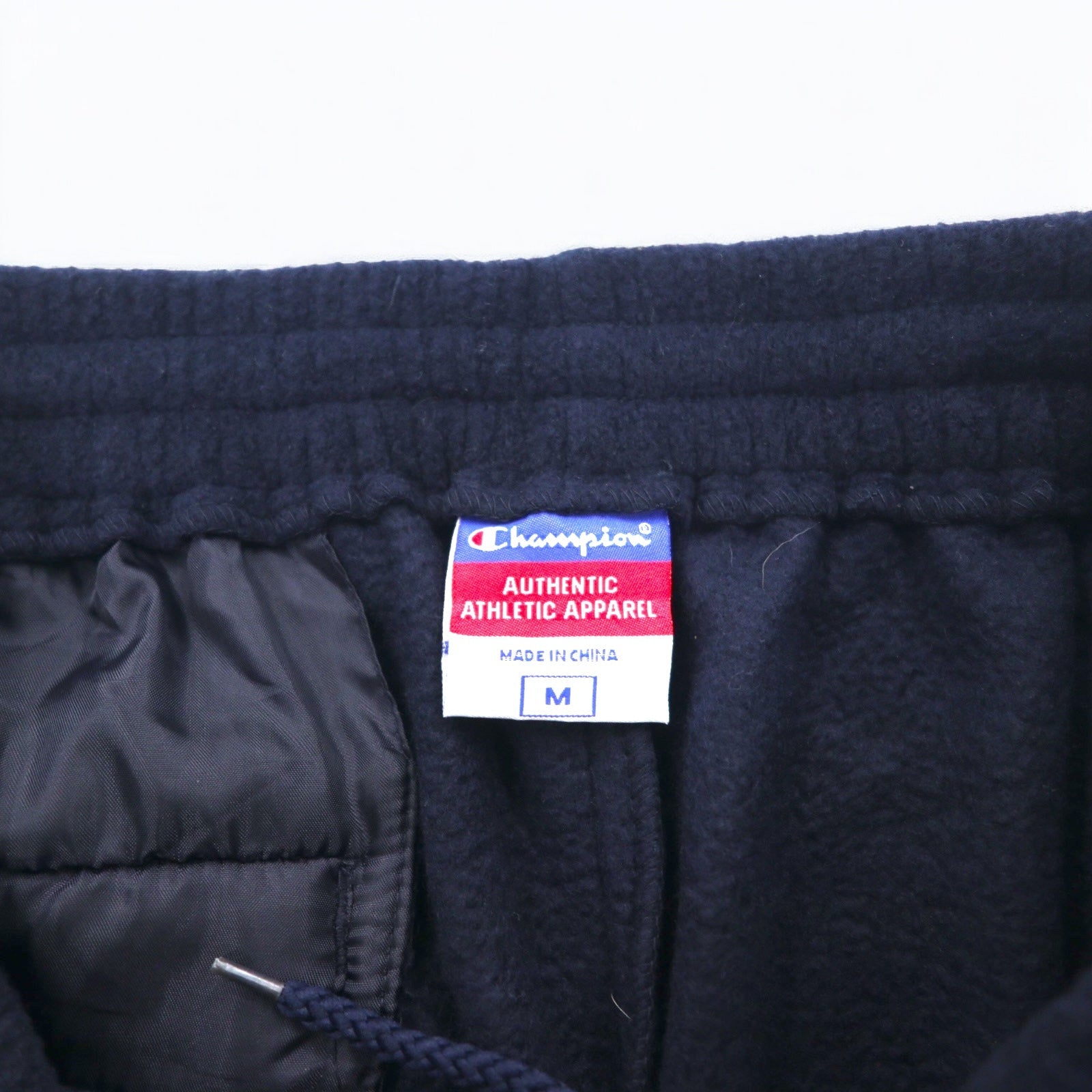 Champion Pantaloni della tuta in pile M Blu scuro Strisce laterali Logo ricamato a punto singolo Bar tag