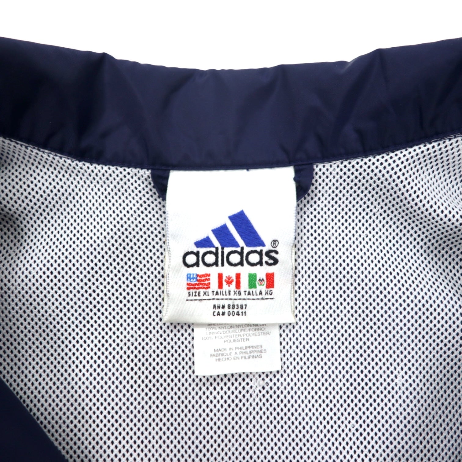 Giacca a vento in nylon Adidas anni '90, mezza zip, taglia XL, blu navy, 3 strisce, etichetta International Collection, oversize