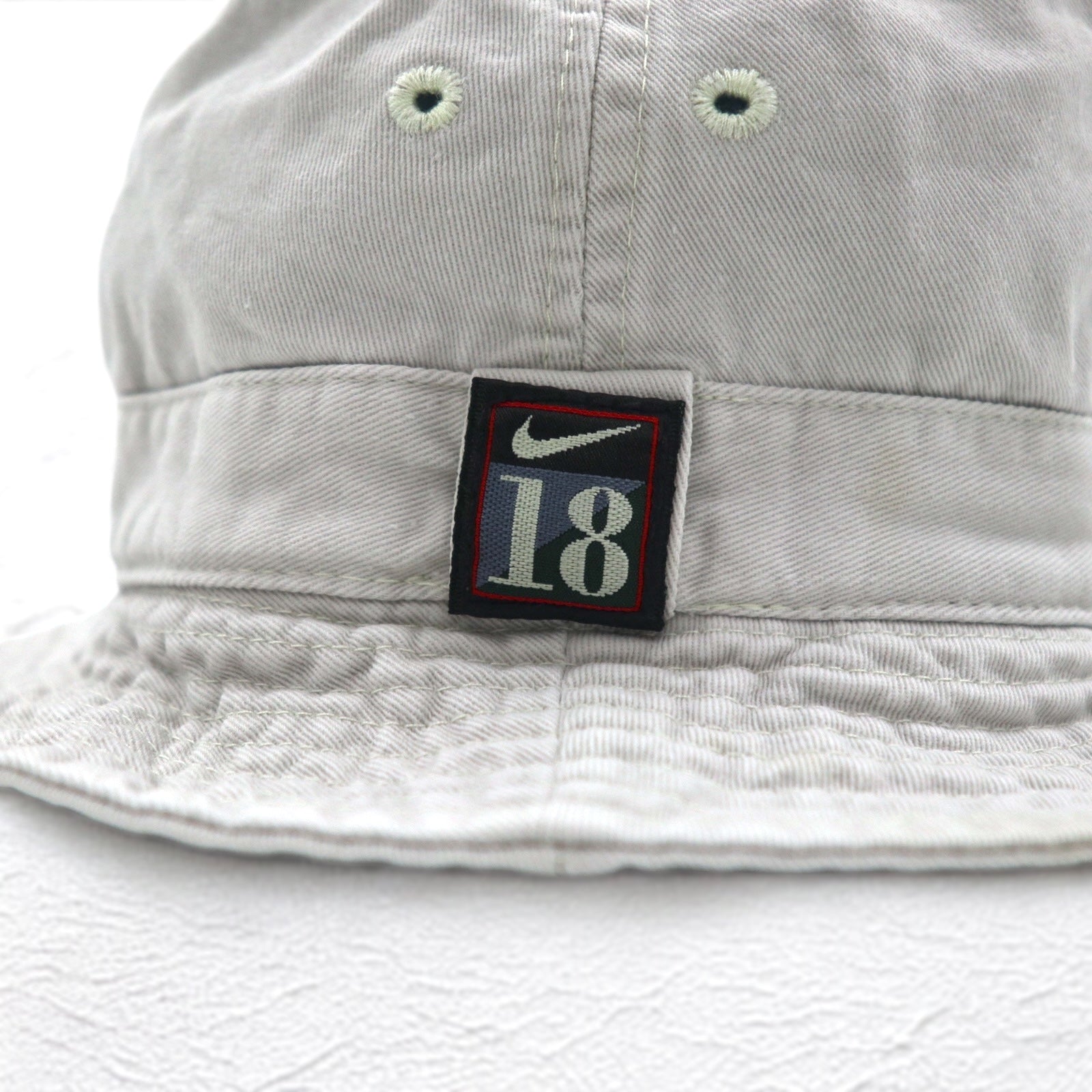 NIKE anni '90, etichetta argento, secchiello con ricamo Swoosh, taglia L, beige, cotone