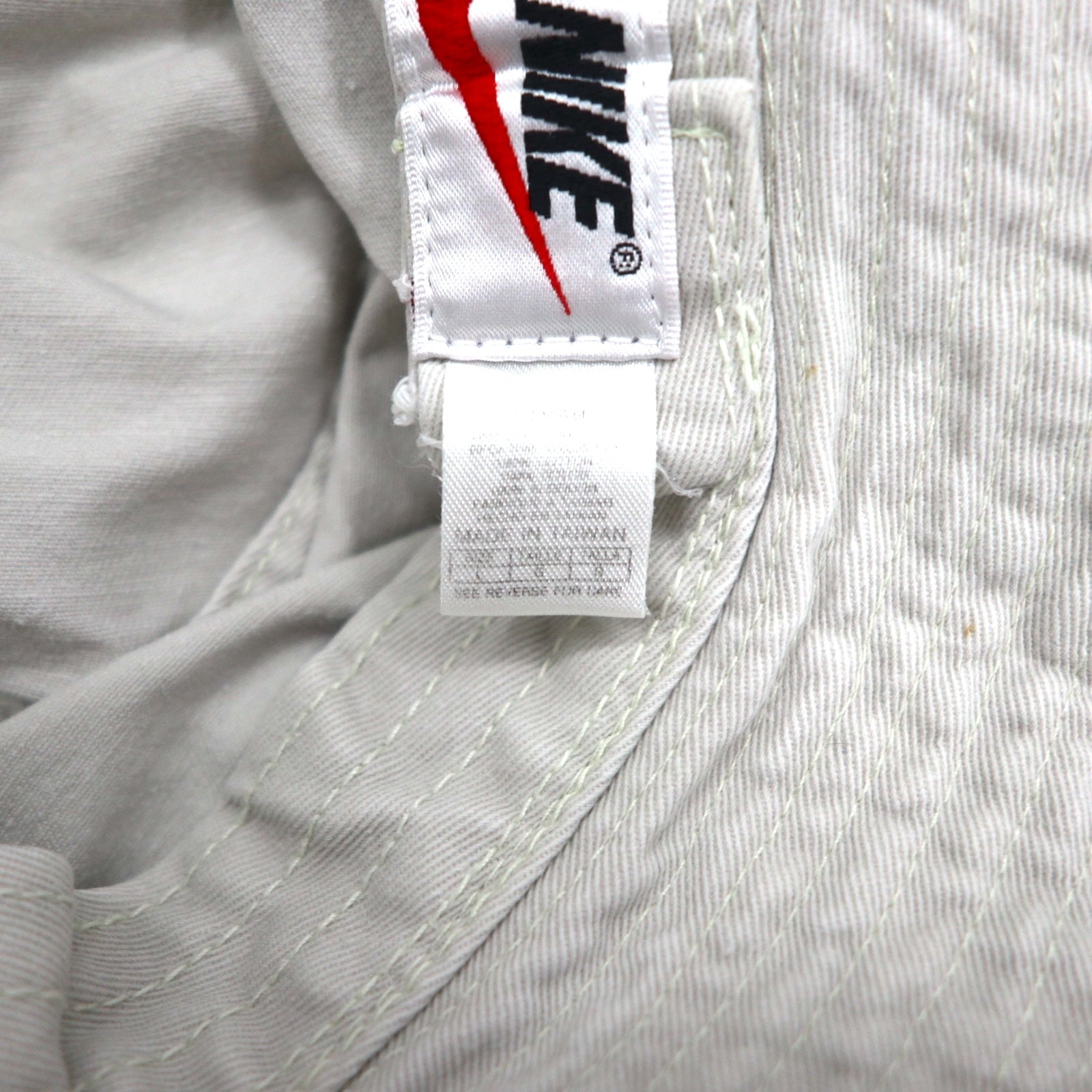 NIKE anni '90, etichetta argento, secchiello con ricamo Swoosh, taglia L, beige, cotone