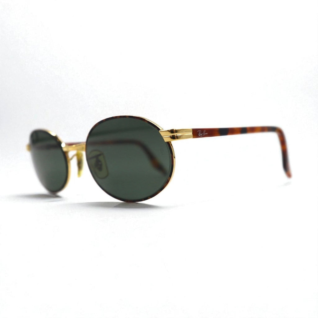 Ray-Ban Occhiali da sole ovali oro tartaruga metallo RB3007 W2188