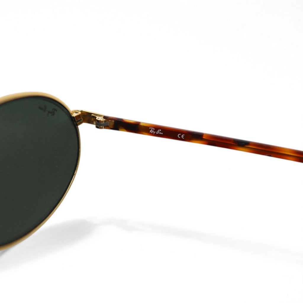 Ray-Ban Occhiali da sole ovali oro tartaruga metallo RB3007 W2188