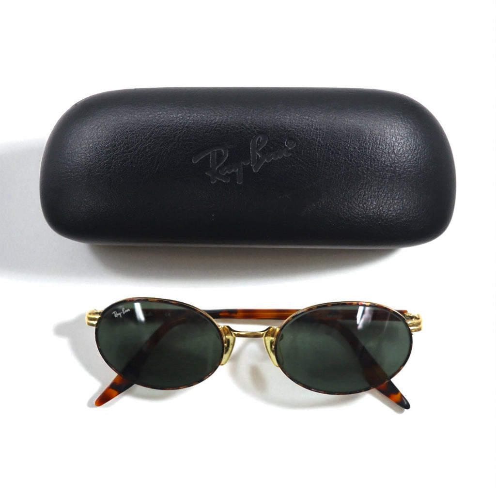 Ray-Ban Occhiali da sole ovali oro tartaruga metallo RB3007 W2188