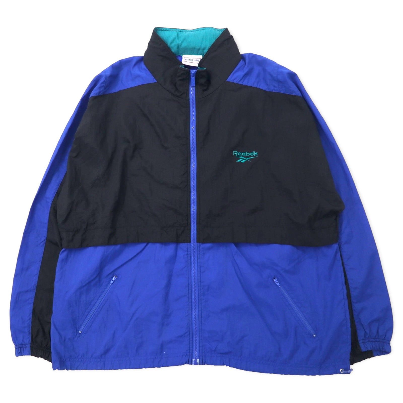 Reebok giacca in nylon anni '90, taglia XL, nero e blu, logo vettoriale, cappuccio ripiegabile