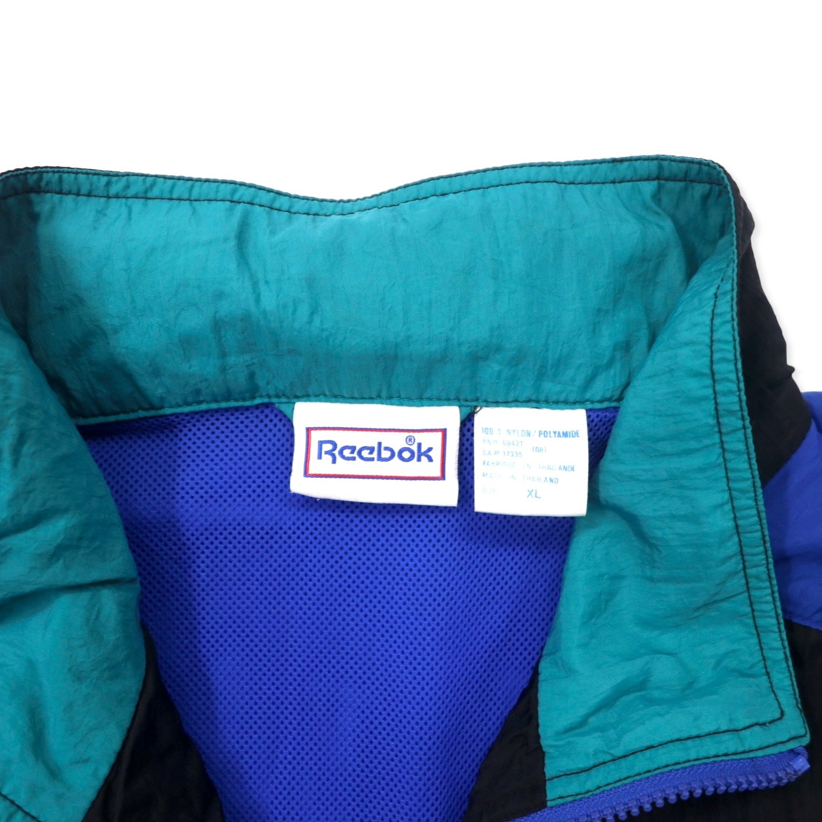 Reebok giacca in nylon anni '90, taglia XL, nero e blu, logo vettoriale, cappuccio ripiegabile