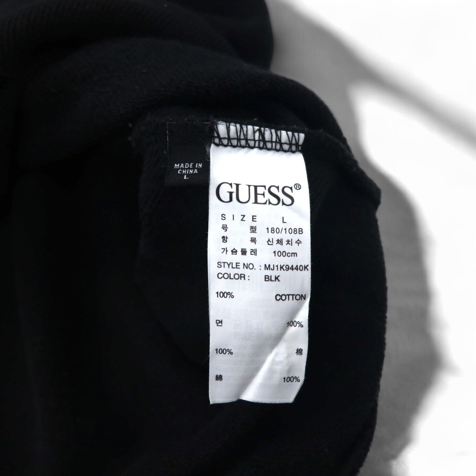 Felpa GUESS con stampa triangolare e logo, taglia L, colore nero, in cotone