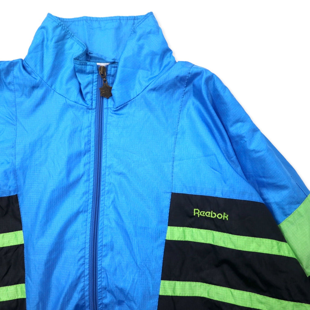 Reebok anni '90 Giacca in nylon Tuta M Blu Poliestere Logo ricamato sulla schiena
