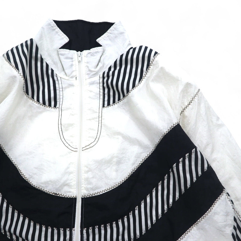 Giacca a vento vintage anni '80 SUNTERRA Giacca in nylon Track jacket L bianca fantasia all-over