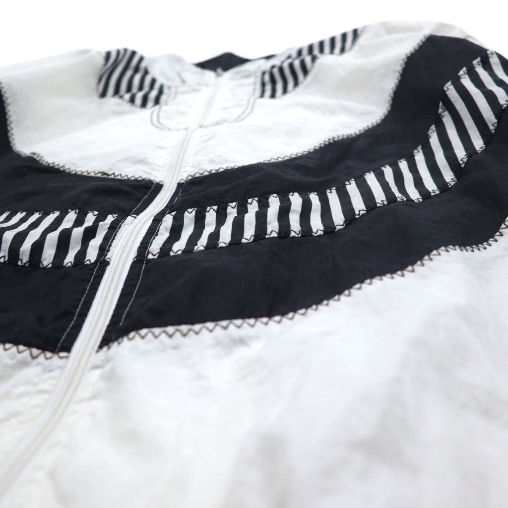 Giacca a vento vintage anni '80 SUNTERRA Giacca in nylon Track jacket L bianca fantasia all-over