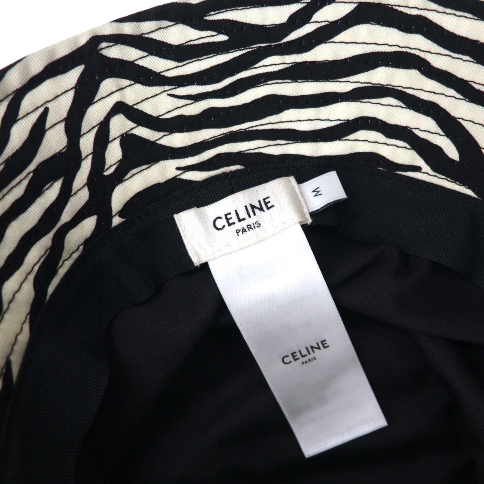 CELINE Cappello a secchiello stampa zebrata M bianco nero fantasia animalier Hedi Slimane 22AW 2AUV1979S