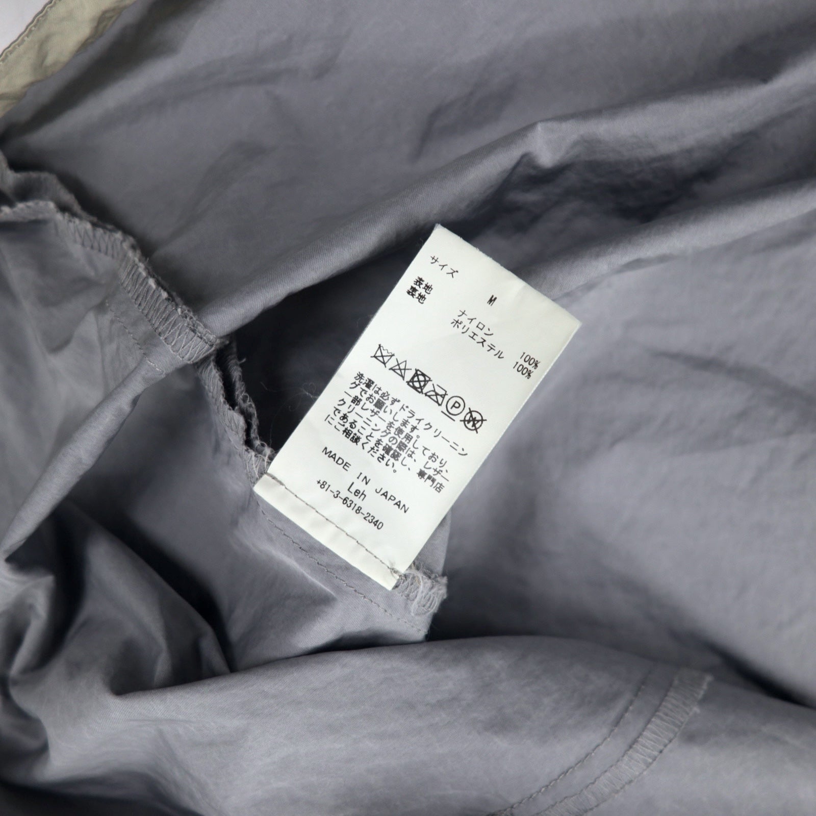 LEH Parka a vento con cappuccio, taglia M, colore grigio, in nylon, con coulisse, spacchi laterali, made in Japan