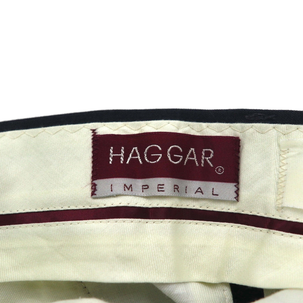 Pantalone classico HAGGAR anni '80 fabbricato negli USA, a due pieghe, con piega centrale, taglia M, grigio, in poliestere e lana.