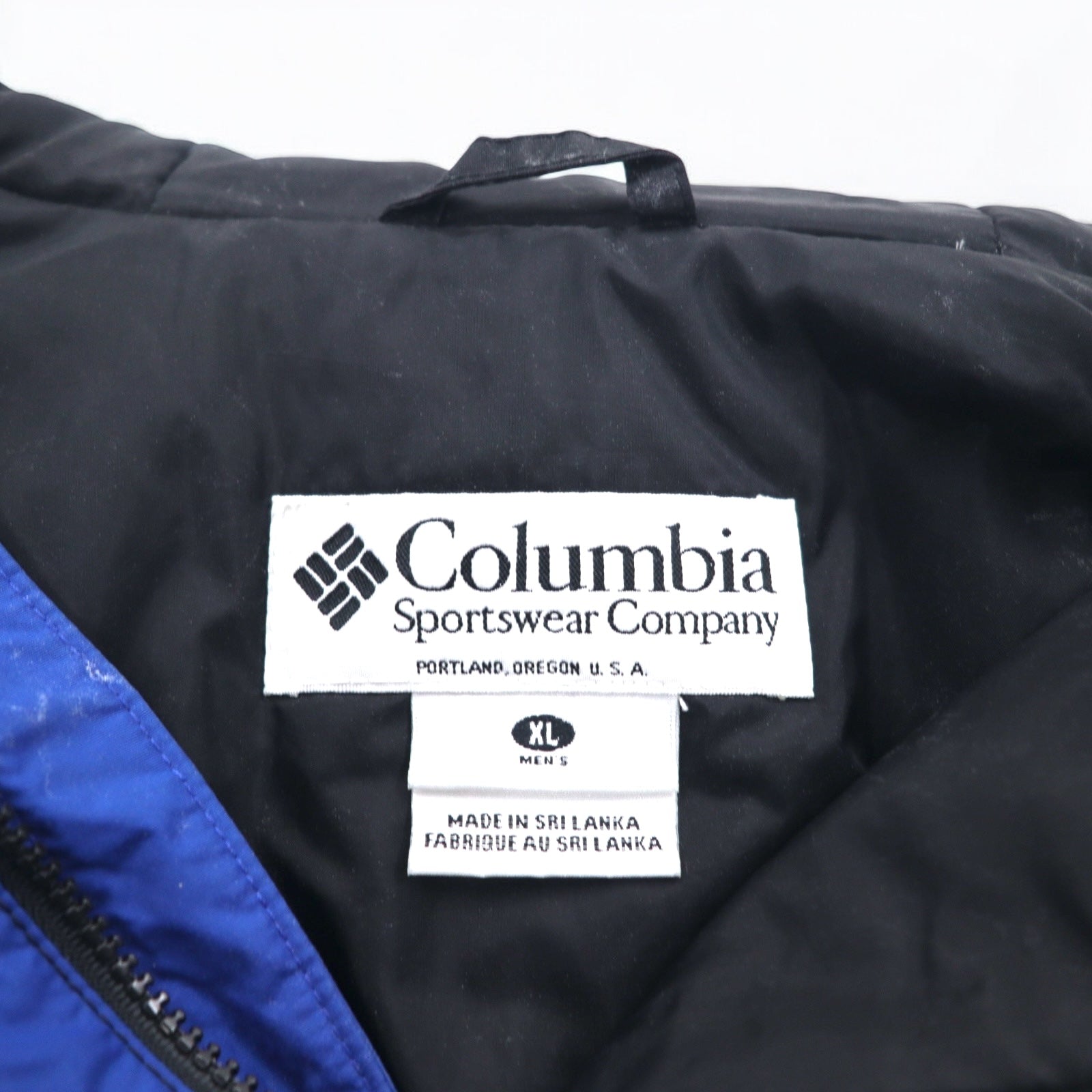 Giacca a vento Columbia, XL, blu e nera, in nylon, doppia cerniera, coulisse, prodotta nello Sri Lanka
