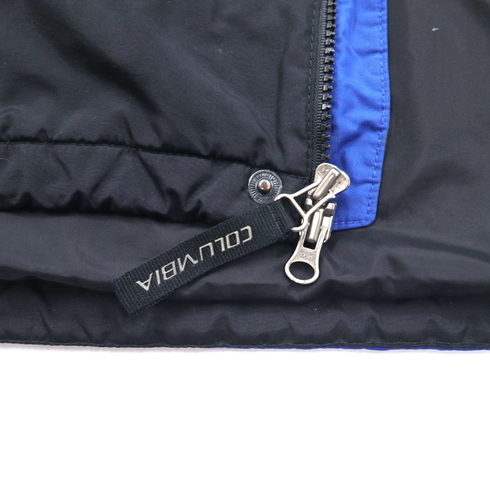 Giacca a vento Columbia, XL, blu e nera, in nylon, doppia cerniera, coulisse, prodotta nello Sri Lanka
