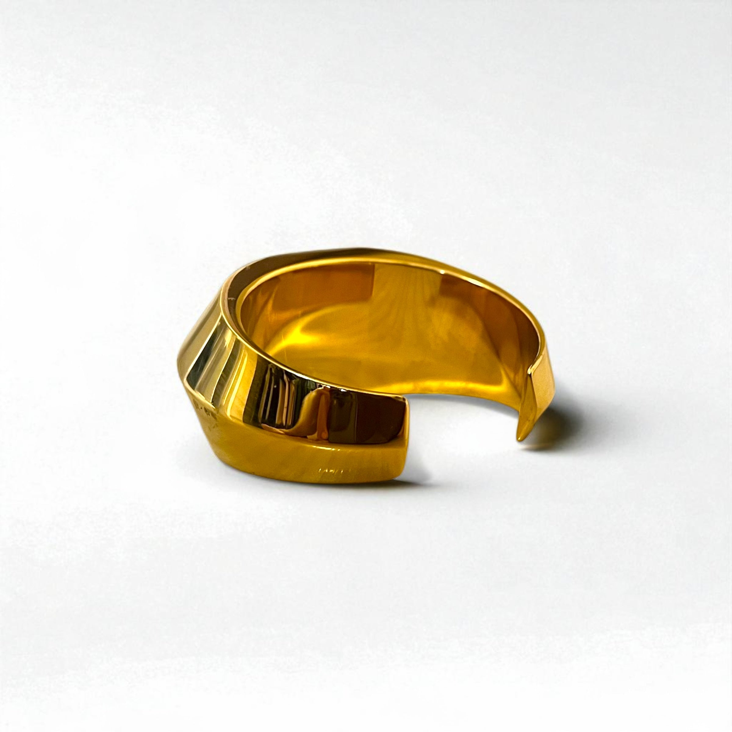 SAINT LAURENT PARIS Bracciale a cerchio in metallo oro nero, bracciale a manetta largo