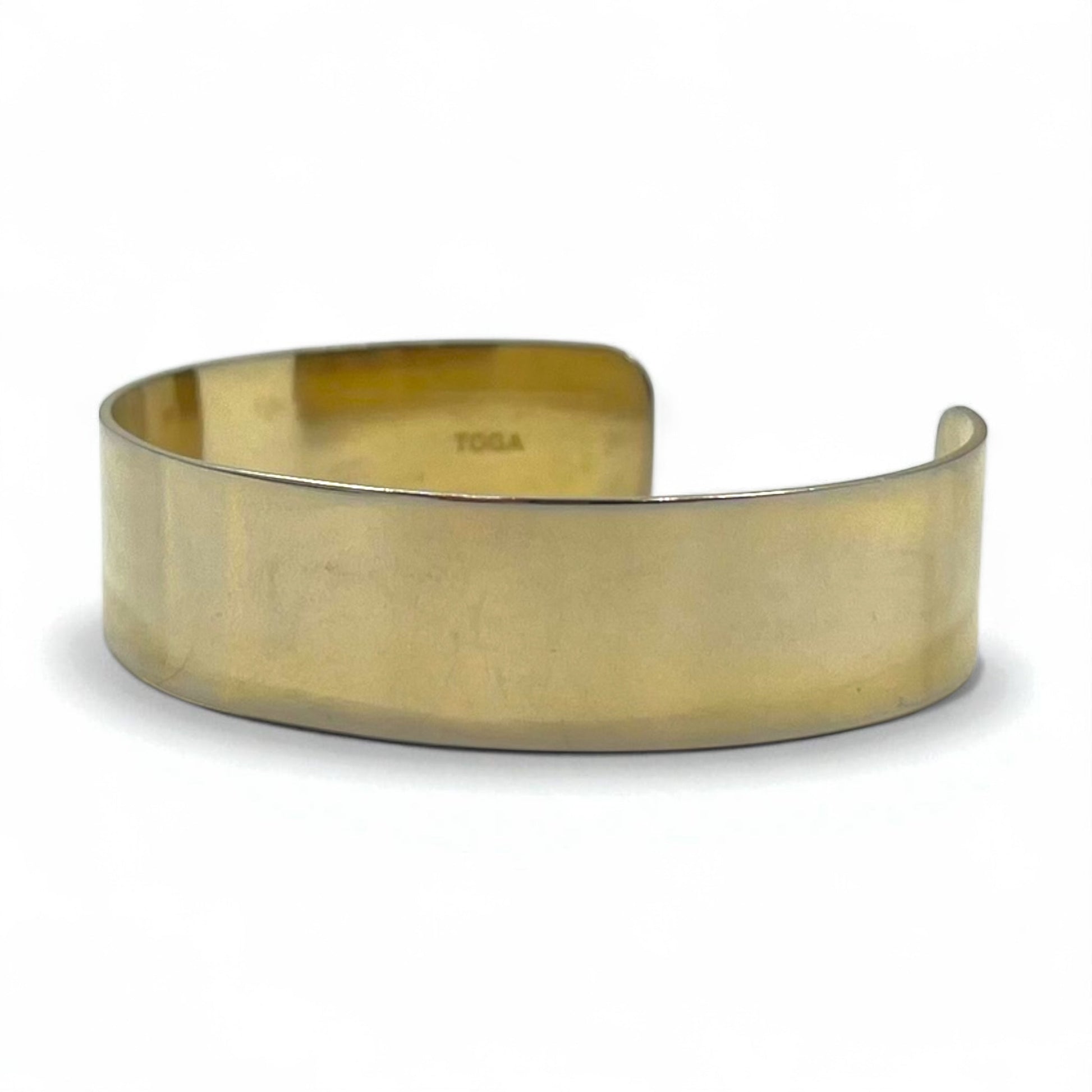 Bracciale rigido TOGA largo color oro in metallo piatto