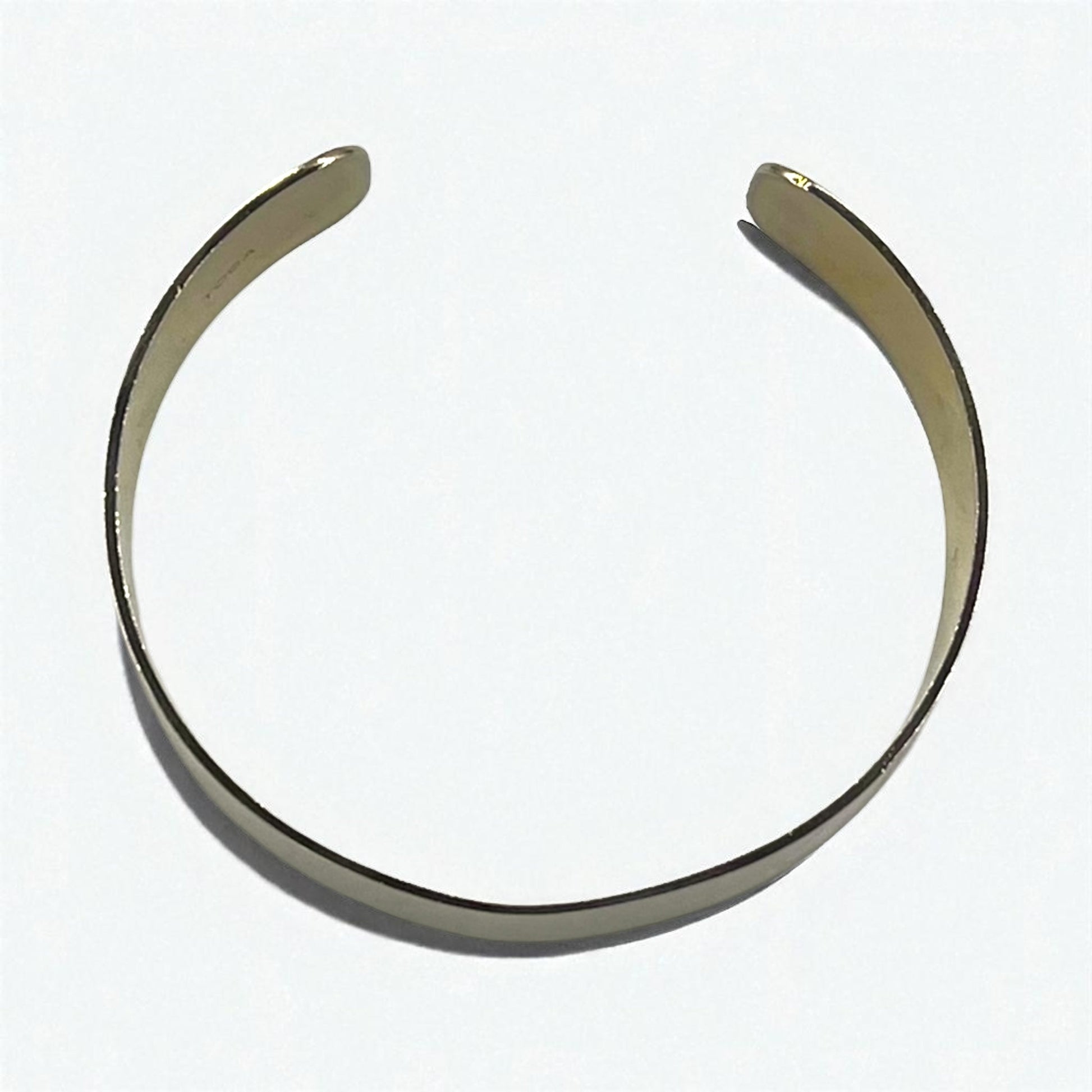Bracciale rigido TOGA largo color oro in metallo piatto