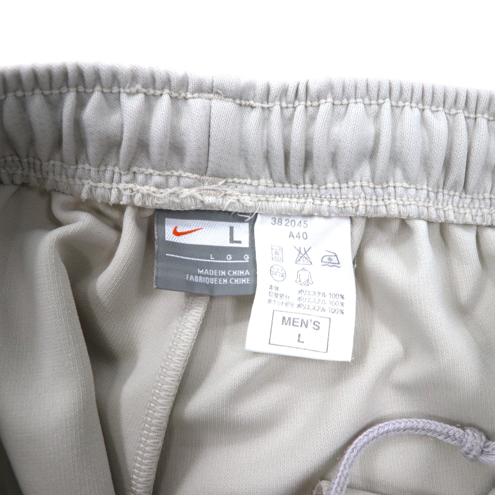 NIKE Pantaloni della tuta, taglia L, beige, poliestere, a righe laterali, logo Swoosh ricamato