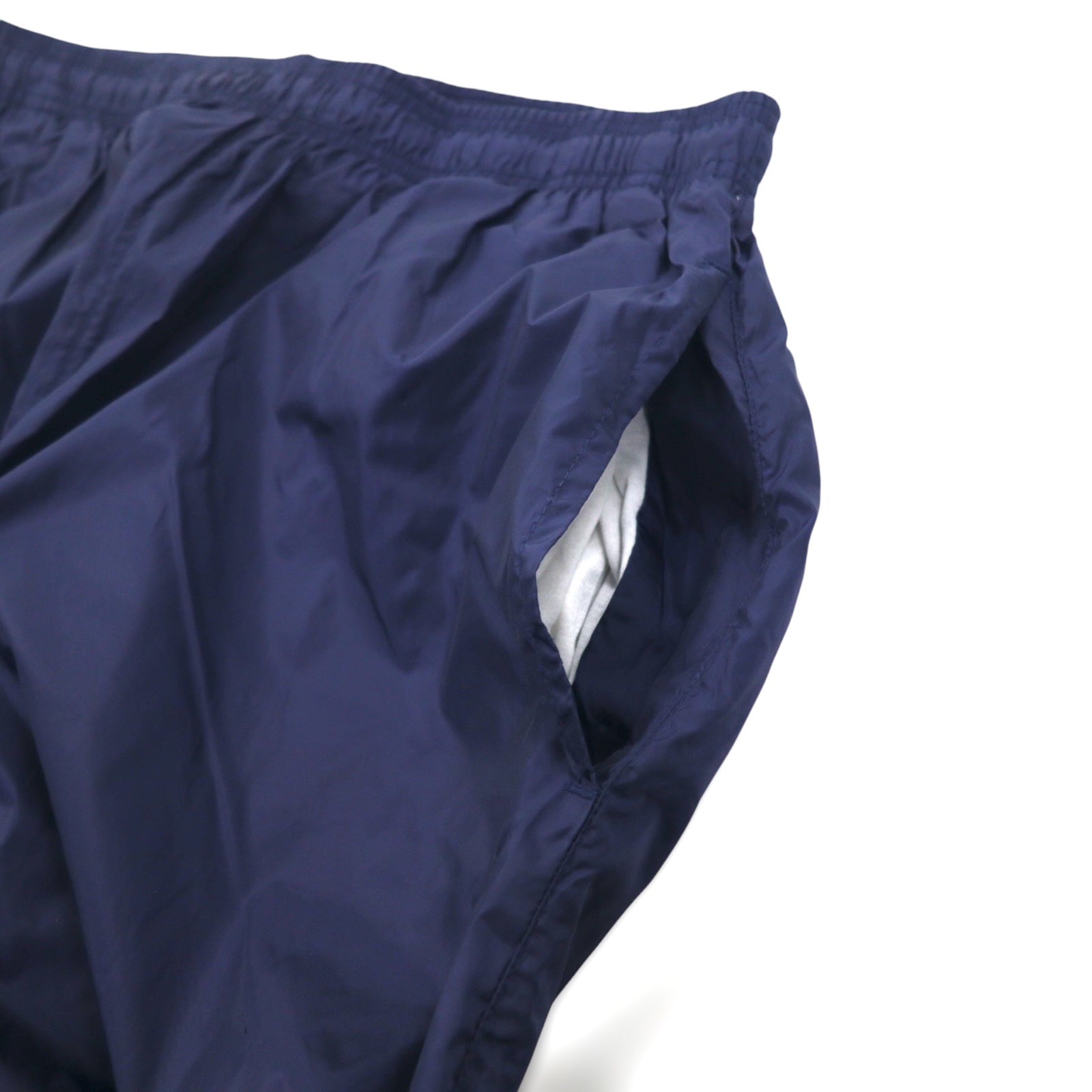 Reebok Anni '90 Pantaloni della tuta in nylon Tuta L Blu navy Logo Vector ricamato Spacco Cerniera sull'orlo
