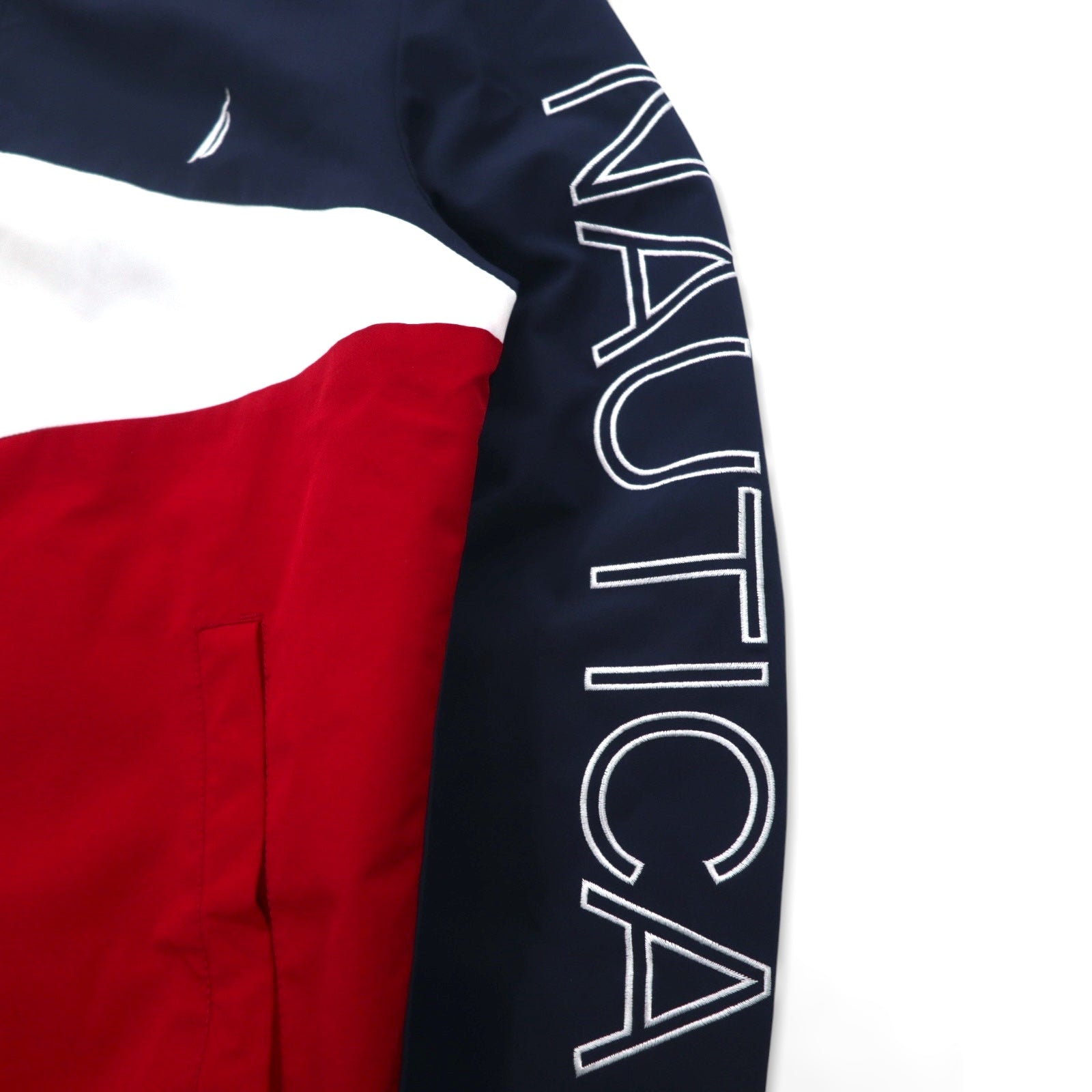 Giacca a vela NAUTICA Giacca a vento in nylon M Colori tricolore Blu navy Logo sulla manica Cappuccio ripiegabile