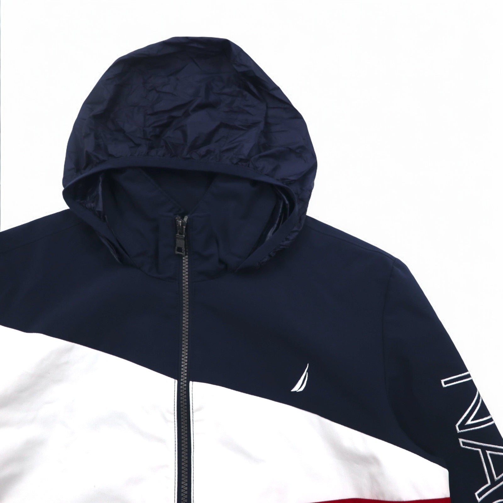 Giacca a vela NAUTICA Giacca a vento in nylon M Colori tricolore Blu navy Logo sulla manica Cappuccio ripiegabile