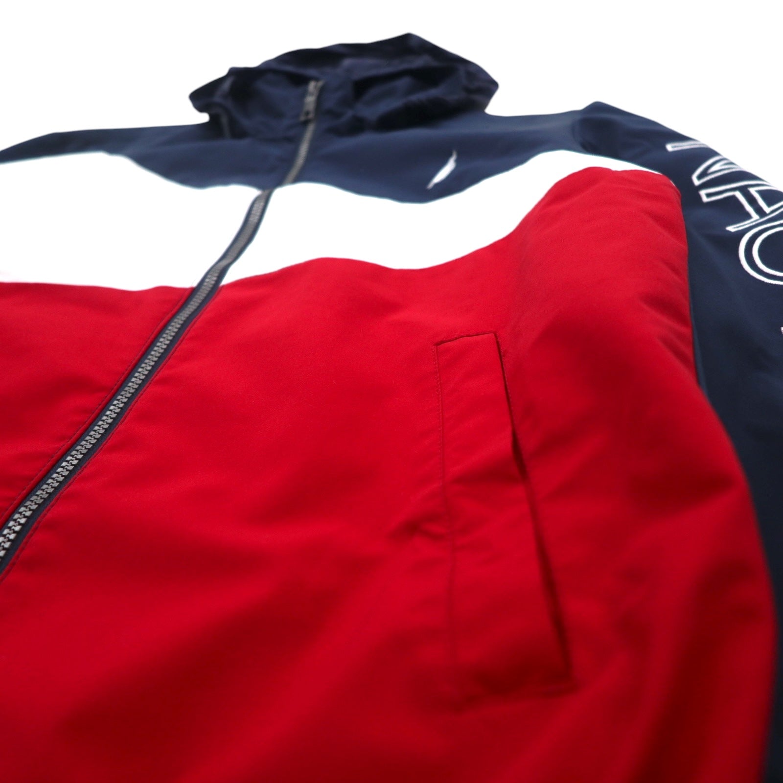 Giacca a vela NAUTICA Giacca a vento in nylon M Colori tricolore Blu navy Logo sulla manica Cappuccio ripiegabile