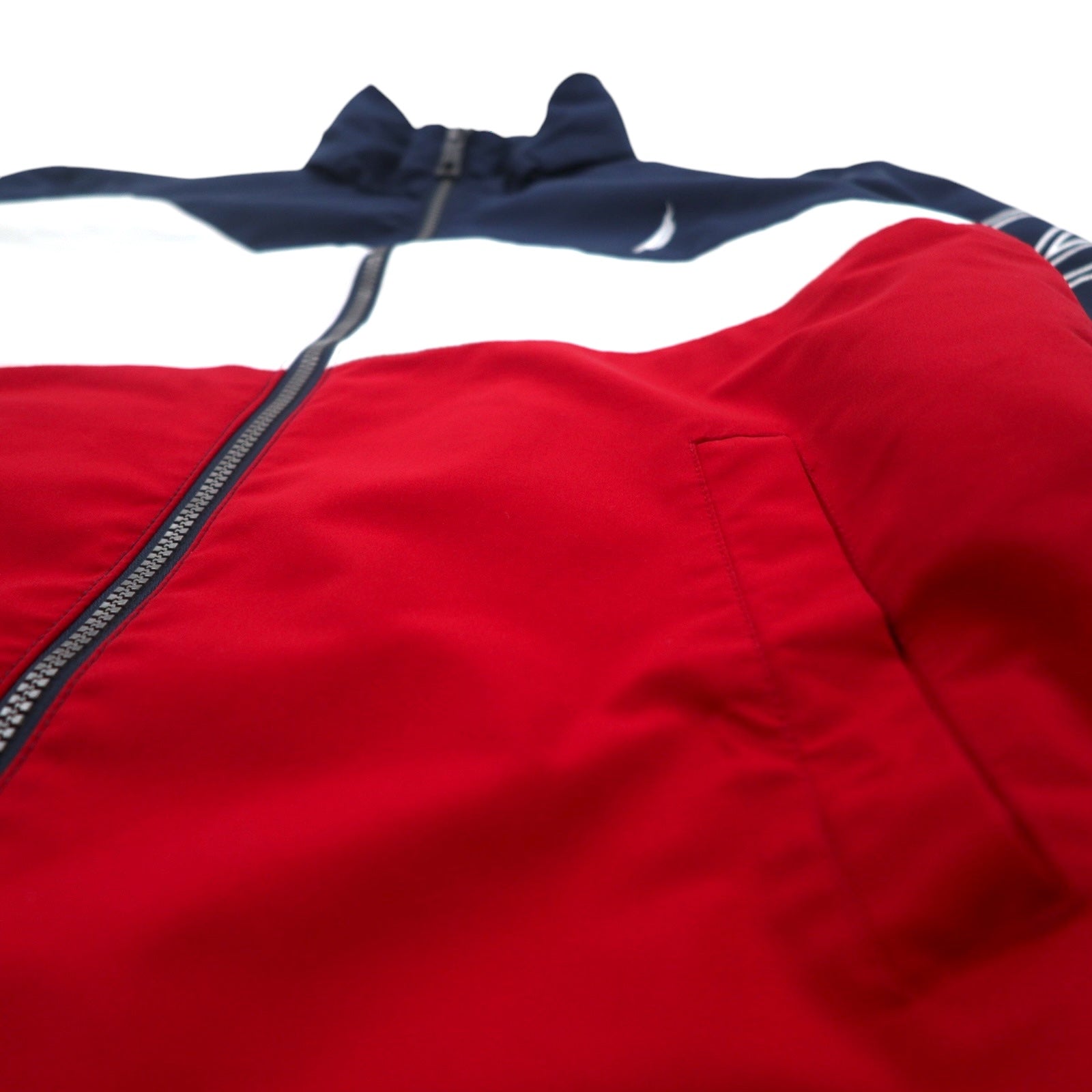 Giacca a vela NAUTICA Giacca a vento in nylon M Colori tricolore Blu navy Logo sulla manica Cappuccio ripiegabile
